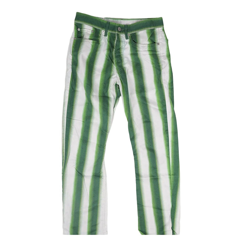 Green and white vertically striped denim jeans laid flat against a light gray background.